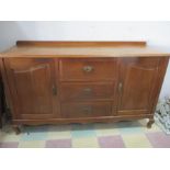 A large French style sideboard with three central drawers