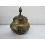 An Eastern brass pot and lid - marked P22/4B to underside
