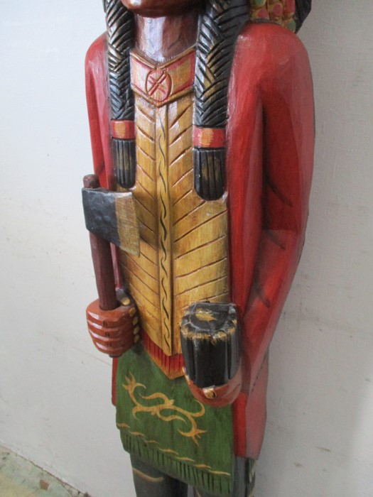 A carved wooden tobacco store Native American in traditional dress with detachable tomahawk, - Image 3 of 7