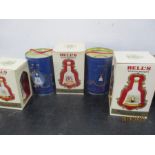 Five commemorative bottles of Bells whiskey with contents