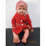 A vintage celluloid style doll