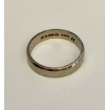 An 18ct white gold wedding band. Weight 4g