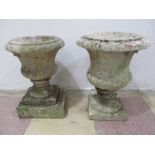 Two marble urns, tallest 38cm