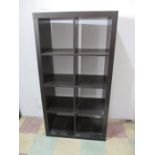 A set of black ash shelves/bookcase