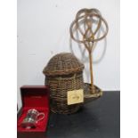 A vintage carpet beater a basket and a pewter tankard