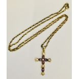 A diamond and amethyst cross and chain