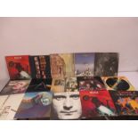 A collection of records and singles including Pink Floyd, Jethro Tull, Meat Loaf, Paul McCartney,