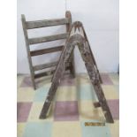 A pair of vintage wooden trestles