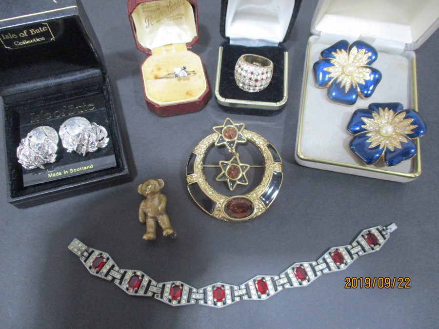 Two Butler & Wilson brooches, hallmarked silver ring, Art Deco paste bracelet and costume