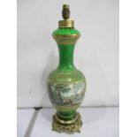 A green glass lamp hand painted with classical scenes A/F