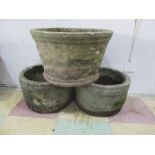 A pair of garden pots along with one other