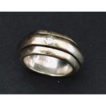An 18ct gold Piaget 'spinner' ring dated 1998. Weight 18.1g