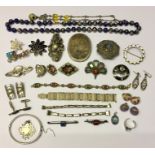 A collection of silver and other jewellery.