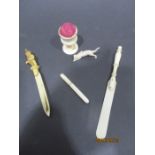 Late 19th/early 20th Century ivory pincushion, letter opener etc.