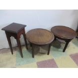 Two small round coffee tables along with one other
