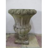 Large concrete garden urn, cracked but seems sound