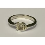An 18ct white gold diamond solitaire ring of 0.57ct