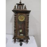 An antique Vienna style wall clock- key in office