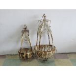 Two wrought iron hanging lamps