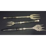 Three horn handled muffin forks