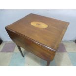 A Victorian inlaid drop leaf table