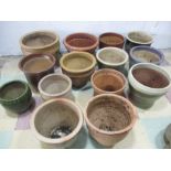 A collection of mainly glazed garden pots