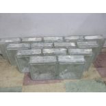 A collection of 14 vintage glass bricks/blocks