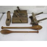 Two vintage exercise clubs along with a small collection of woodworking planes etc.