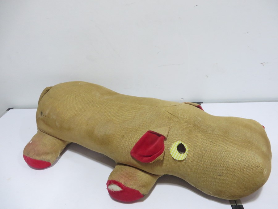 A footstool in the form of a hippo