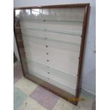 A wall mounted models display cabinet with glass shelves