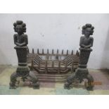 An antique fire grate and dogs