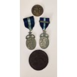 Two Masonic medals along with two medallions.