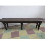 A Victorian oak bench