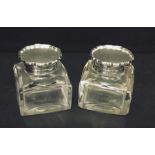 A pair of hallmarked silver topped inkwell - George Lambert, London 1901