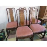 A set of five Chinese hardwood dining chairs