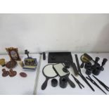 A collection of ebonised dressing table items, candlesticks etc along with a quantity of faux