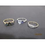 A 9ct gold sapphire 3 stone ring along with a 9ct gold dress ring and a diamond 3 stone in 9ct
