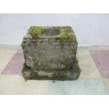 A well weathered marble funerary urn