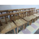 A set of 12 hand made country style elm chairs
