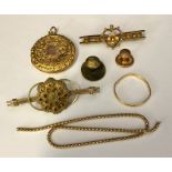 A small collection of gold and unmarked gold jewellery including a 15ct gold Masonic stud, 9ct