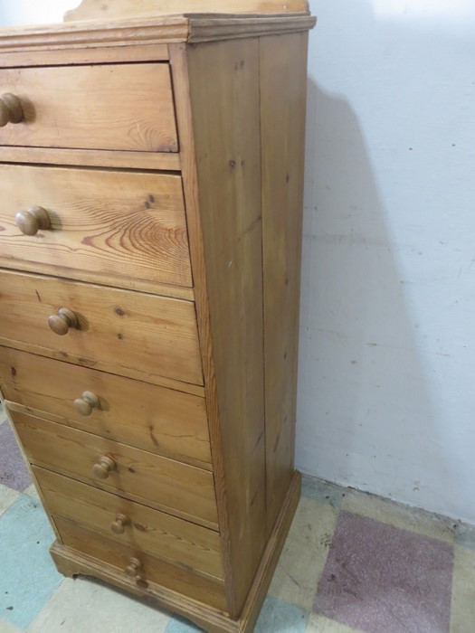 A narrow pine chest of seven drawers - Image 3 of 6
