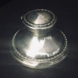 A hallmarked silver inkwell