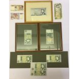 A small collection of bank notes including £1 notes and a £5 note etc.