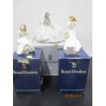 A Lladro figure "At the ball" along with two Royal Doulton figures