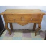 A pine buffet/console table with two drawers