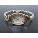 A 9ct gold ladies Omega cocktail watch on expandable strap