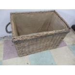 A wicker log bin