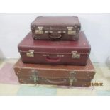 Three vintage suitcases