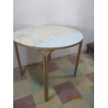A vintage round table, the top a map of Devon