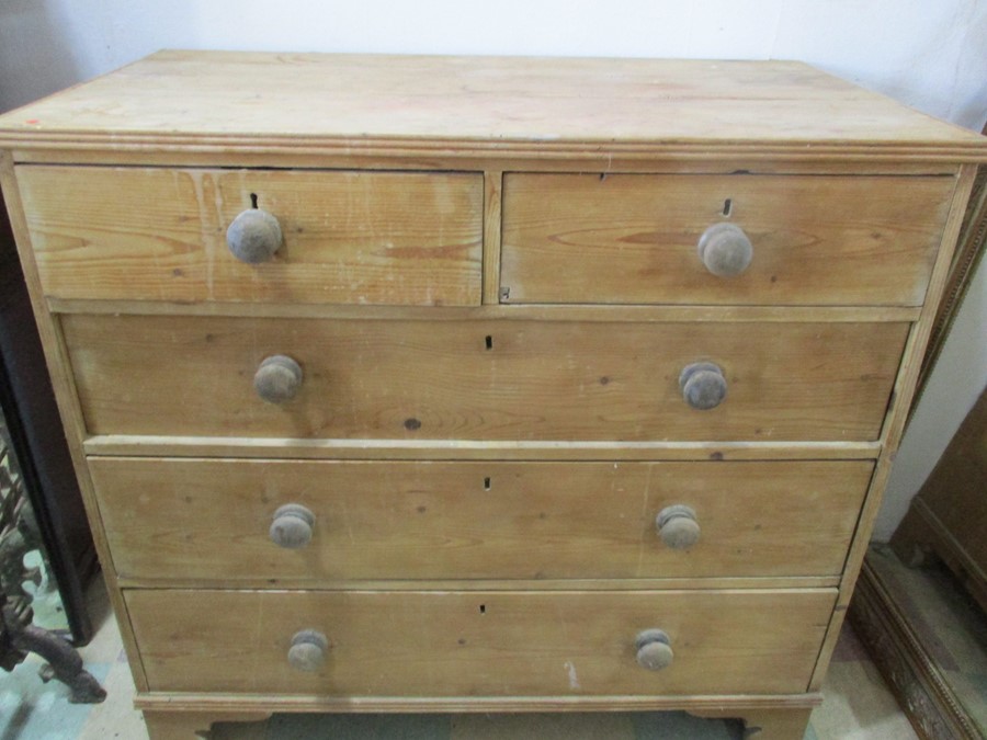 A Georgian pine chest of five drawers